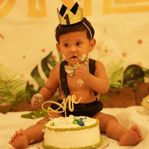 birthday a picture of a baby boy smashing cake